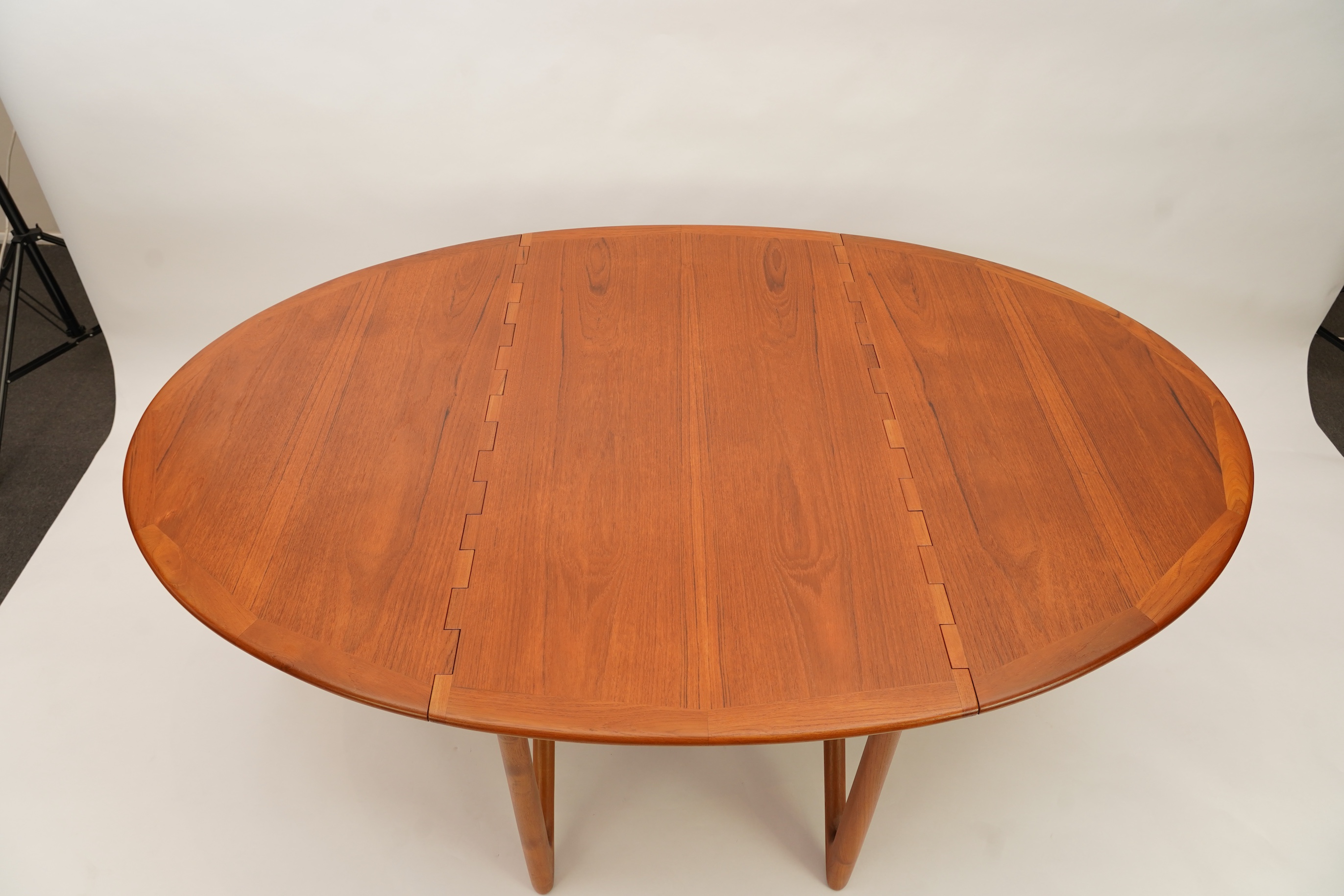 Niels Koefoed (Danish, b. 1929) for Koefoeds Møbelfabrik: A teak 'Oval Klap' dining table
